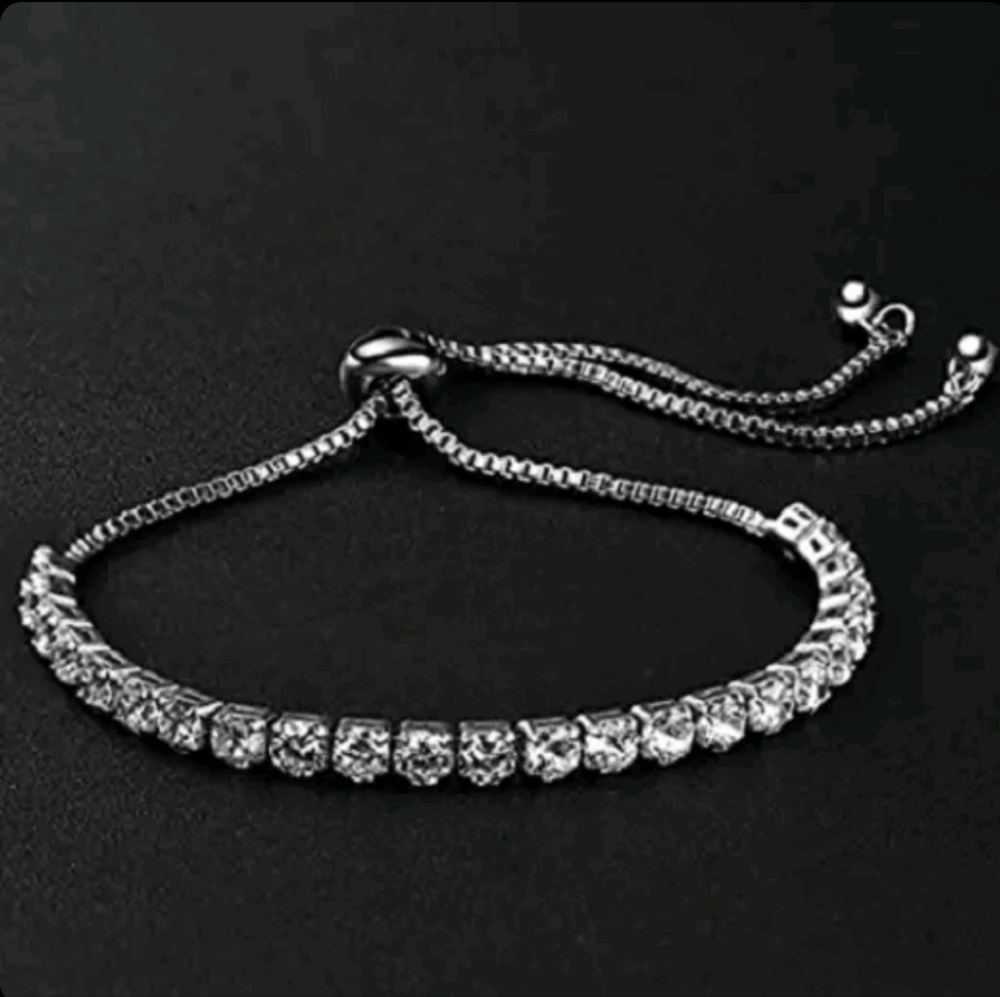 Cubic zirconia pandora style tennis bracelet 24k white gold